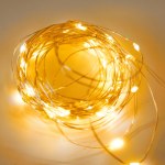 Светодиодная гирлянда "Роса" на батарейках, 70 теплых белых светодиодов на серебристом проводе